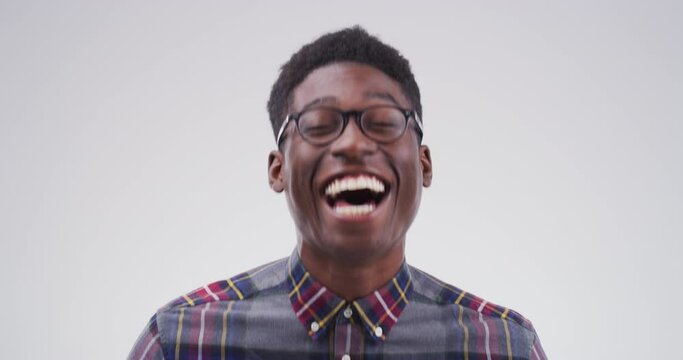 Black man, laugh and funny portrait in studio, white background or comedy mockup. Happy, smile and person with comic emoji, reaction or expression to meme humor, joke or crazy announcement of news
