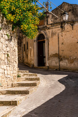 The narrow streets of the baroque style city of Modica, Sicily, Italy - 669770809