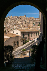 The narrow streets of the baroque style city of Modica, Sicily, Italy - 669771082
