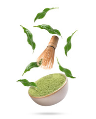 Green matcha powder in bowl, whisk and leaves falling on white background