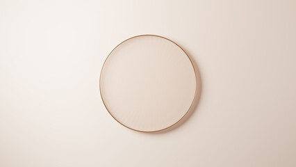 ベージュ背景に金色の台座。円形の金とガラス。俯瞰。（横長）