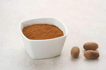 Pala Bubuk (Nutmeg Powder) on white bowl
