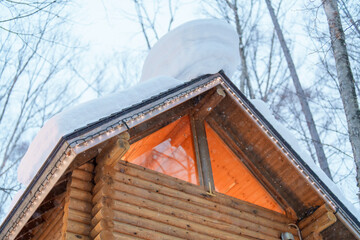 Beautiful Cottage in the forest at Furano Ningle Terrace with Snow in winter season. landmark and popular for attractions in Hokkaido, Japan. Travel and Vacation concept