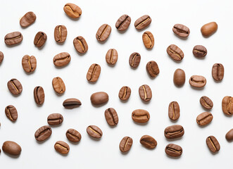 Scattered coffee beans isolated on white