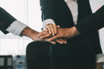 Obraz premium Businessman shaking hands to seal a deal with his partner lawyers or attorneys discussing a contract agreement