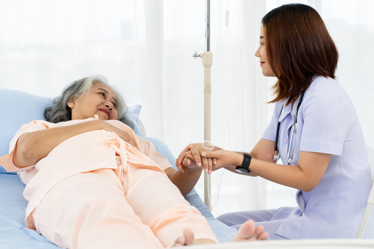 A nurse is providing emotional support to a patient who is under stress related to her illness.