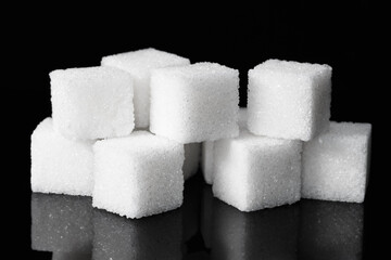 Sugar cubes on a dark background