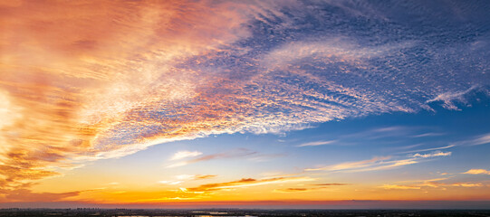 Fototapeta na wymiar Beautiful sunset sky clouds background