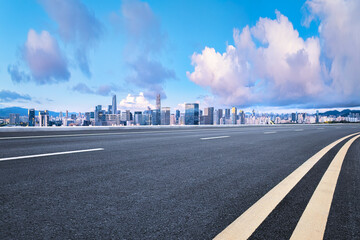 Shenzhen asphalt road and city financial district skyline background