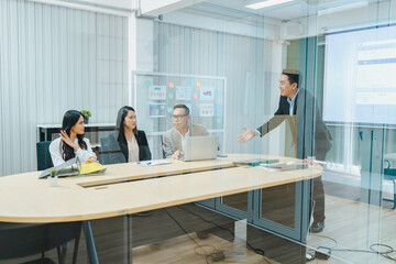 Businesspeople team partner meeting together to brainstorming for new ideas about business marketing project to partner working together planning success strategy enjoy teamwork in modern office