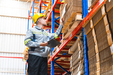 Factory manager, foreman worker checking stock inventory on good shelf in delivery storehouse of logistic storage warehouse, shipping distribution business, package box industry job for retail market