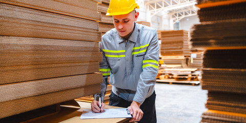 Factory manager, foreman worker checking stock inventory on good shelf in delivery storehouse of logistic storage warehouse, shipping distribution business, package box industry job for retail market