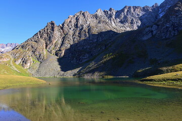 Ailampa lake located on Ak-Suu Traverse trek next to Jyrgalan and Karakol in Kyrgyzstan