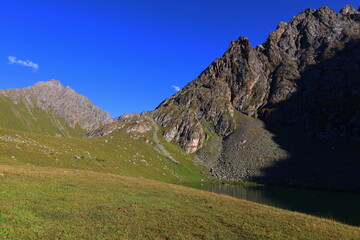 Fototapeta premium Ailampa lake located on Ak-Suu Traverse trek next to Jyrgalan and Karakol in Kyrgyzstan