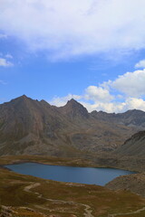 Fototapeta na wymiar Fourth stage of Ak-Suu Traverse trek from Boz-Uchuk lake to Aylanysh Pass, Karakol, Kyrgyzstan