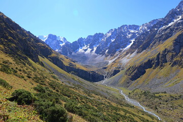 Fototapeta na wymiar Ninth stage of Ak-Suu Traverse trek from Karakol Gorge to Jeti Oguz in Karakol national park, Kyrgyzstan