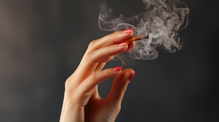 Smoking female hand with a cigarette, concept of getting rid of bad habits, quitting smoking