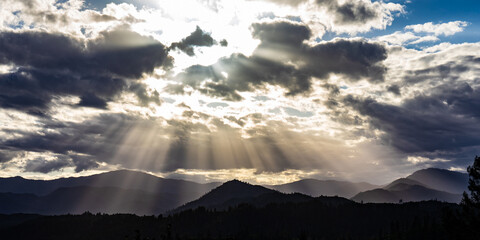 Rays / Beams of Sunlight Shining Over Death Valley Mountains