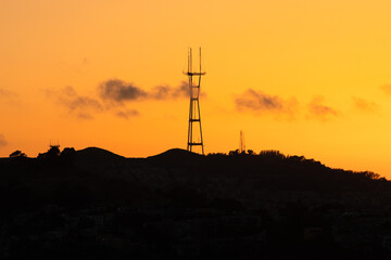 Sutro Tower in San Francisco Against Orange Sunset
