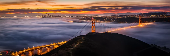 Foto auf Acrylglas Golden Gate Bridge San Francisco Golden Gate Bridge at Sunrise Covered in Fog / Clouds