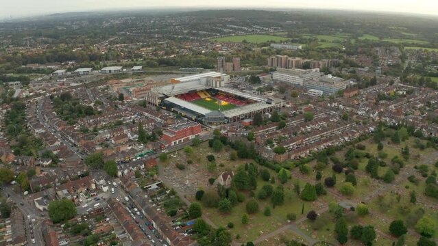 Close circling aerial shot of Vicarage road stadium