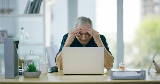Senior man, home office and headache at laptop, stress and risk of debt, 404 glitch or budget error. Frustrated guy at computer for tax challenge, doubt or bankruptcy crisis for retirement investment