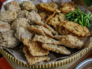 Fried tempeh, tofu, vegetable bakwan and green chilies