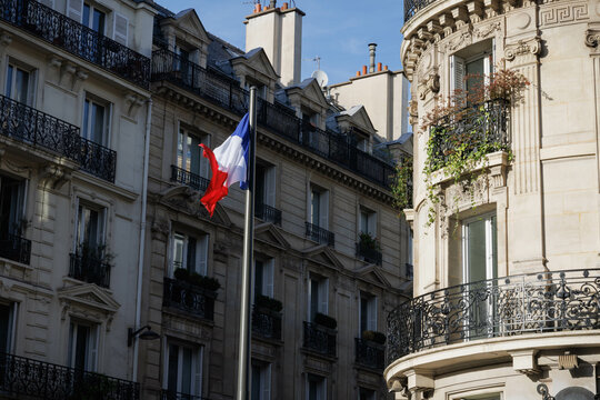 The French flag above the St Germain neighborhood of Paris, France.