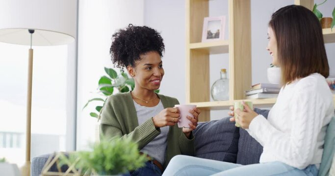 Home conversation, coffee and happy women, friends or discussion on gossip news, communication or morning drinks. Lounge couch, talking and people relax with matcha green tea, latte or espresso mug