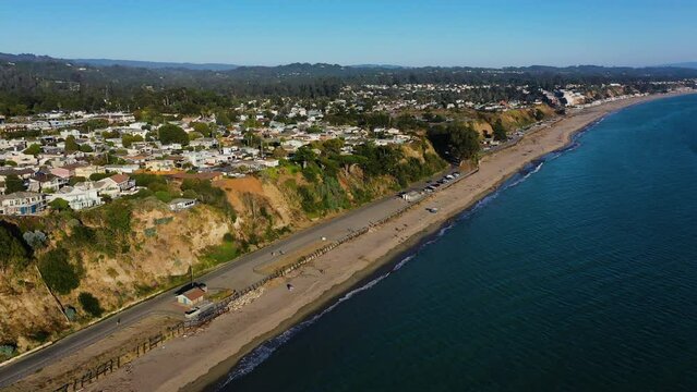 Aerial view circling the Aptos beach and the coast of Rio del Mar, California