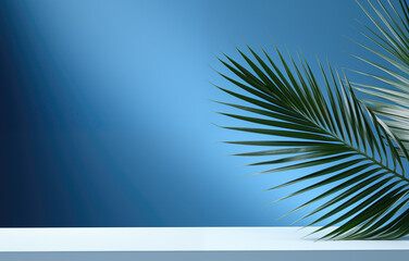 Fototapeta na wymiar Empty white tabletop with palm leaves and blue wall in the background. High quality photo