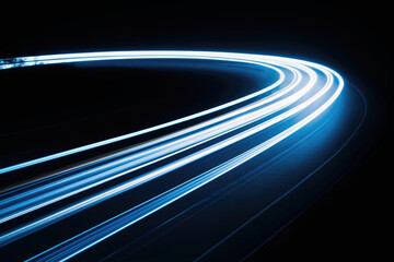 Long exposure capturing car blue speed light trails in a tunnel. High quality photo