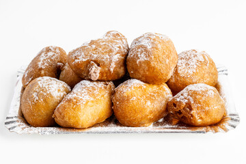 Plate of buñuelos de viento with cream and truffle typical dessert of the day of the saints in...