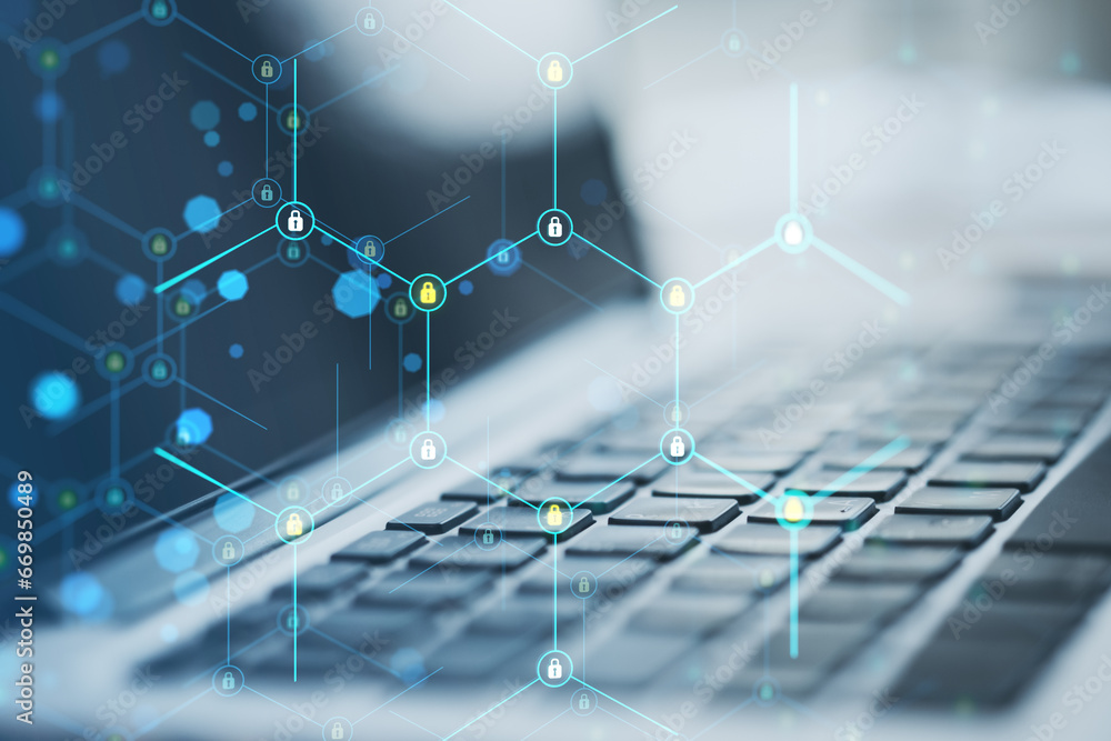Poster Close up of laptop computer on desk with creative glowing hexagonal pattern with tiny padlocks on blurry background. Digital security and firewall concept. Double exposure.