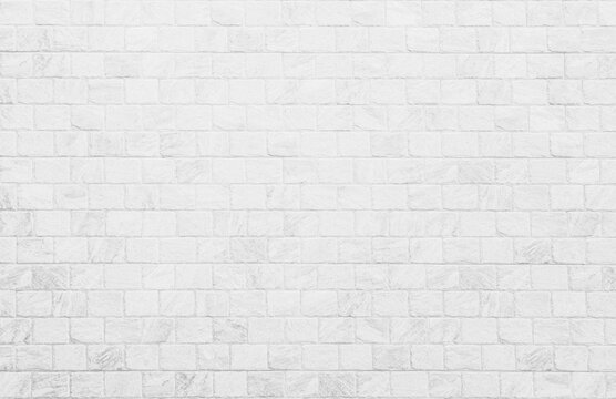White grunge brick wall texture background for stone tile block in grey light color wallpaper interior and exterior and room backdrop design. Abstract white brick wall texture for pattern background.