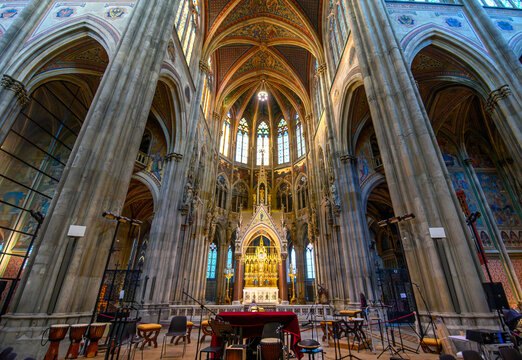 Vienna, Austria - 15.10.2023: Interior of Votivkirche or Votive Church. Famous Neo-Gothic church with Stained glass