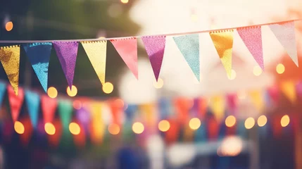 Fotobehang Colorful triangular flags on blur background for outdoor party celebration © Ameer