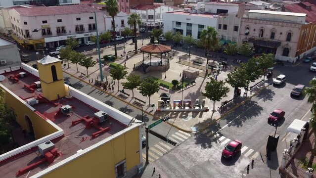 Shot of the letters of El Parral Chihuahua Centro, with the kiosk in the background drone 4K