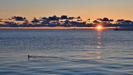 Sunrise scenery at Lake Michigan with amazing clouds background