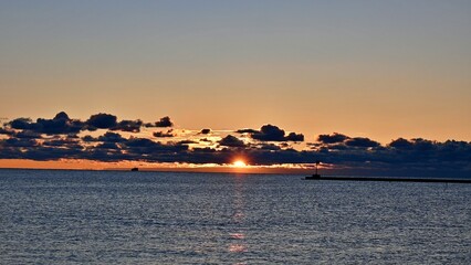 Sunrise scenery at Lake Michigan with amazing clouds background