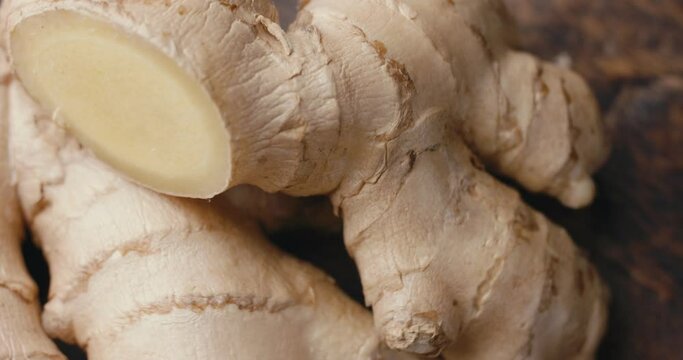 Ginger root healthy food organic ingredient spins in macro close up