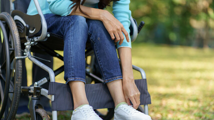 Obraz premium Depressed sad asian woman in wheelchair&nbsp;lonely disabled adult