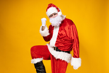 Fototapeta na wymiar Santa Claus rejoices at the successful completion of business.