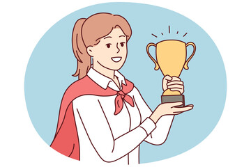 Fototapeta premium Portrait of smiling young female employee holding golden prize in hands celebrate business promotion or triumph. Happy businesswoman with award. Vector illustration.