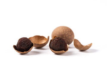 Dried longan on wooden table