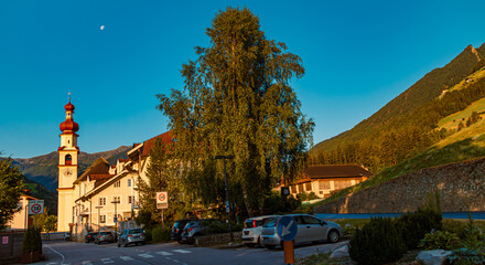 Fototapeta na wymiar Alpine summer view with a church at St Johann, San Giovanni, Ahrntal valley, Pustertal, Trentino, Bozen, South Tyrol, Italy