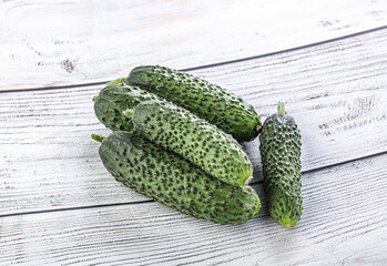 Fresh natural organic cucumbers heap