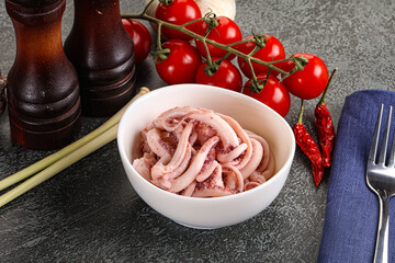 Delicous marinated squid tentacles in the bowl