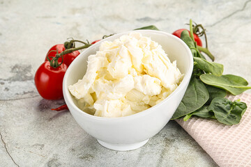 Soft cream cheese in the bowl