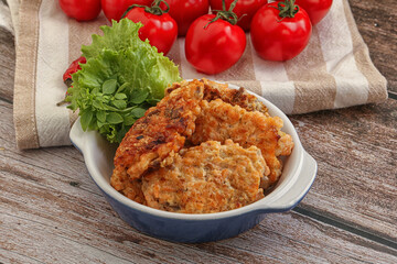 Fried salmonn cutlet in the bowl